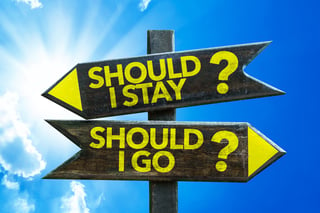 Should I Stay? Should I Go? signpost with sky background.jpeg