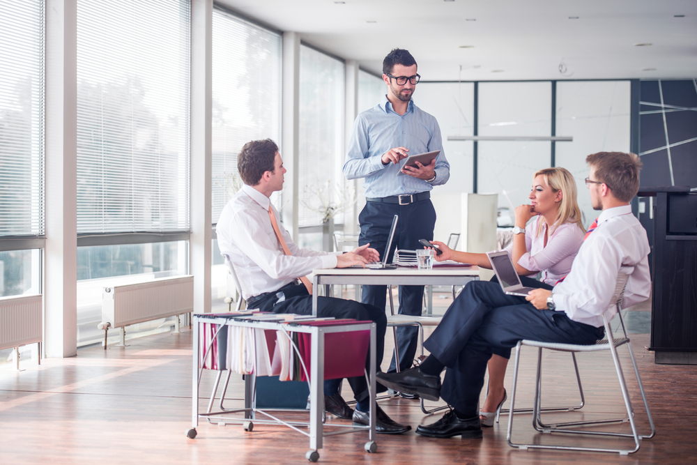 Business people sitting at corporate meeting-1